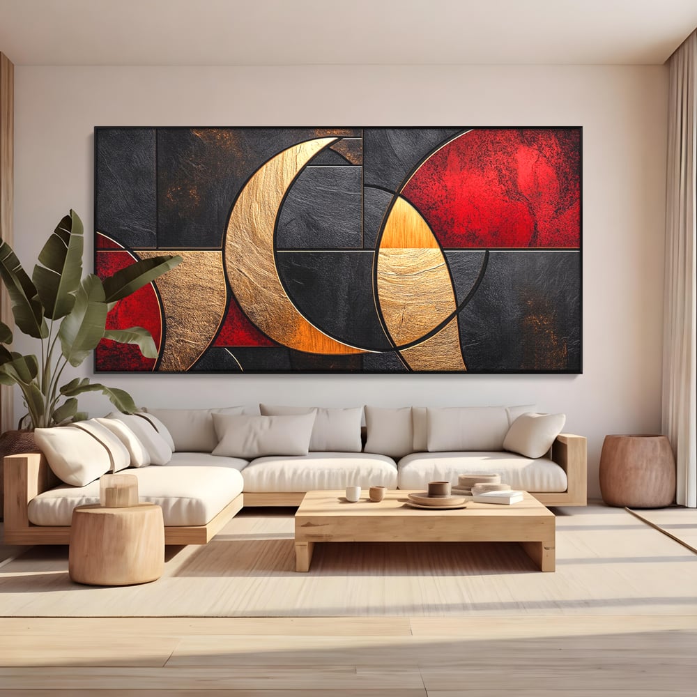Tablou canvas cu tablou canvas cu forme geometrice aurii si rosii, in rama de aluminiu negru, pe perete intr-un living